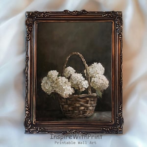 May include: A framed print featuring a still life of white hydrangeas in a woven basket. The basket is brown, and the flowers are a bright white. The frame is ornate with a dark bronze finish. The text "InspireWithPrint Printable Wall Art" is at the bottom.