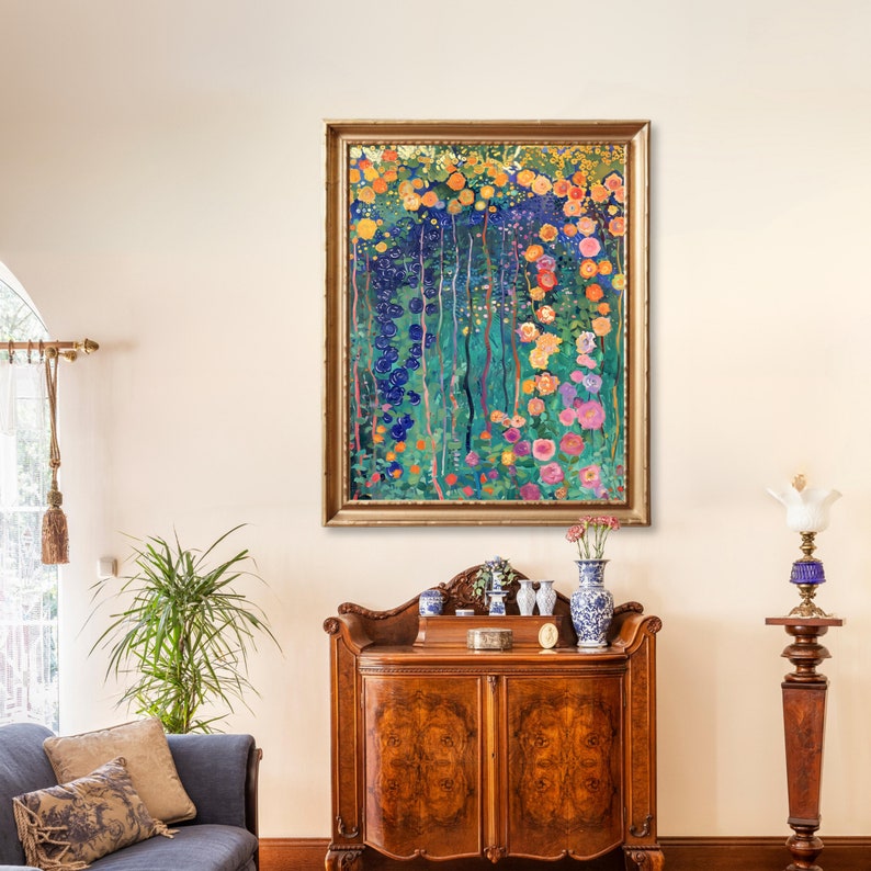 May include: A framed painting of a colorful floral garden with blue, green, yellow, pink, and orange flowers. The painting is in a gold frame and is hanging on a white wall.