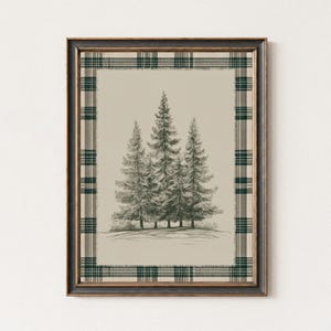 May include: Framed art print featuring a pencil sketch of three evergreen trees. The artwork is set against a beige background with a green and black plaid border. The frame is dark brown.