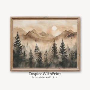 Könnte beinhalten: Gerahmter Aquarelldruck einer Waldlandschaft mit Bergen, Bäumen und Sonne. Das Kunstwerk verwendet Braun- und Beigetöne. Der Text "InspireWithPrint Printable Wall Art" befindet sich am unteren Bildrand.