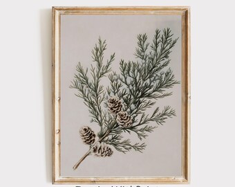 May include: A framed botanical print featuring a detailed illustration of a pine branch with pine cones and small white berries. The artwork is set against a neutral background and framed in a gold-colored frame. The text "InspireWithPrint Printable Wall Art" is at the bottom.