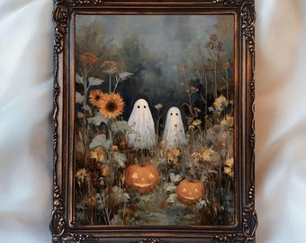 May include: A framed Halloween-themed print featuring two white ghost figures in a field of sunflowers and pumpkins. The artwork has a vintage aesthetic with a dark, moody color palette. The frame is ornate and bronze-colored. The text "InspireWithPrint Printable Wall Art" is at the bottom.