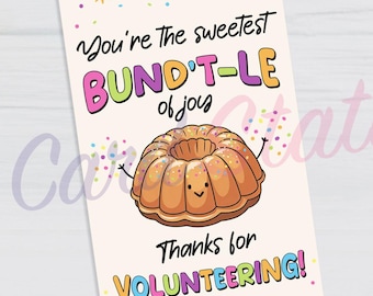 May include: A printable gift tag with a cartoon bundt cake illustration. The tag reads "You're the sweetest BUND'T-LE of joy" and "Thanks for VOLUNTEERING!". The tag is 2 inches by 3.5 inches.