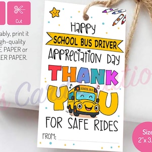 May include: A white gift tag with the text "Happy School Bus Driver Appreciation Day." The tag features a yellow school bus illustration and the words "Thank You For Safe Rides." The tag is 2 x 3.5 inches.