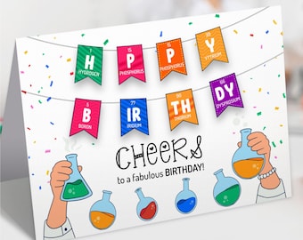 May include: A birthday card with a science theme. The card features a colorful banner with the letters "HAPPY BIRTHDAY" spelled out using chemical element symbols. The card also features a cartoon scientist holding a beaker and the text "CHEERS to a fabulous BIRTHDAY!"