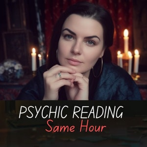 May include: A woman with dark hair and a blue shirt sits in front of a dark background with lit candles. The text "PSYCHIC READING Same Hour" is displayed at the bottom of the image.