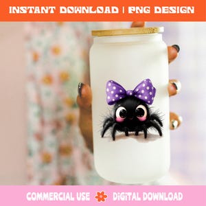 May include: A white glass tumbler with a bamboo lid, decorated with a cartoon spider wearing a purple polka dot bow. The spider has large eyes and a smiling expression. The text "INSTANT DOWNLOAD | PNG DESIGN" is at the top.