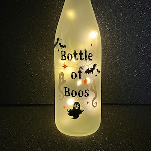 Handmade Frosted Glass Bottle – “Bottle of Boos” with Ghosts, Bats, Spider Webs & Warm Fairy Lights