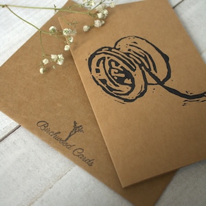 Carte de voeux Yoyo sculptée à la main et estampée