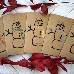 Ensemble de cartes de vœux sculptées et estampillées à la main de la famille bonhomme de neige