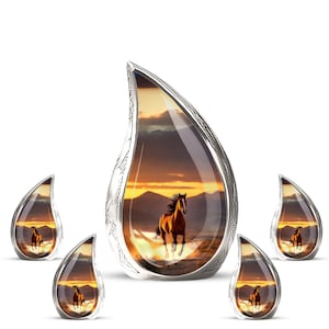 May include: Five teardrop-shaped pendants with silver frames. Each pendant displays a sunset scene with a running brown horse. The background shows mountains and a golden sky, evoking a sense of freedom.