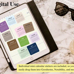 May include: A tablet displaying a digital planner page with multiple colorful square calendar stickers in shades of blue, purple, brown, pink, and green. The screen shows the text Digital Use and a note about dragging stickers into apps.