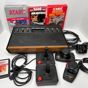 Vintage Original Atari 2600 Woodgrain 6-Switch Gaming Center Console w/ Games Joystick Controllers Paddle Controllers Bundle TESTED - WORKS