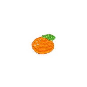 May include: An orange embroidered iron-on patch with a green leaf. The orange is a simple design with a textured surface.