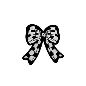 Peut inclure: Un nœud noir et blanc à carreaux avec un contour noir. Le nœud est un élément décoratif qui peut être utilisé à diverses fins, comme ajouter une touche de fantaisie à un projet artisanal ou ajouter une touche festive à un cadeau.