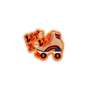 May include: An embroidered patch featuring a roller skate and the text "Let's Roll" in brown and orange.