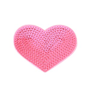 May include: A pink heart-shaped patch made of sequins.