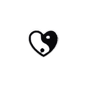 May include: A heart-shaped patch featuring a yin and yang symbol. The patch is divided into two sections: a black section with a white dot and a white section with a black dot. The patch has a white border.