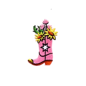 May include: Pink cowboy boot with a white star and yellow flowers in the top. The boot is embroidered with a floral design.