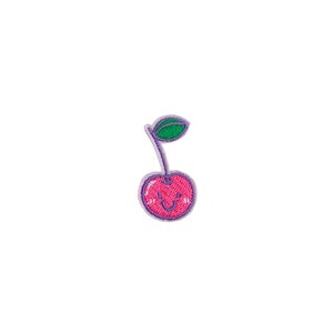 May include: A pink cherry with a purple stem and green leaf. The cherry has a smiling face.