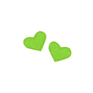 May include: Two green felt heart-shaped patches.