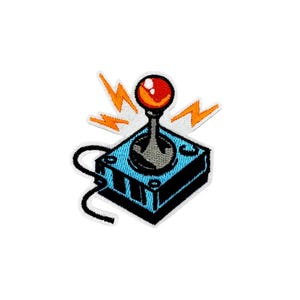 May include: A blue and black joystick with a red button and orange lightning bolts. The joystick is a vintage style video game controller.