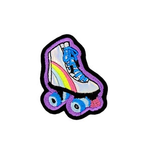 May include: A purple and white roller skate with rainbow accents. The skate has blue wheels and a white boot with a rainbow design.