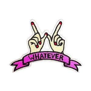 May include: Embroidered patch featuring two hands forming the letter "W" with red nail polish. A pink banner below reads "WHATEVER" in white letters. The patch has a white border and is designed for application on clothing or accessories.