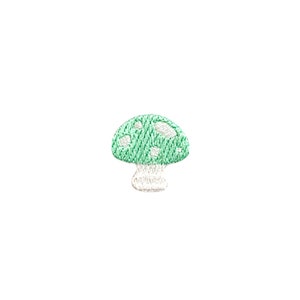May include: A green mushroom with white spots and a white stem. The mushroom is embroidered on a white background.