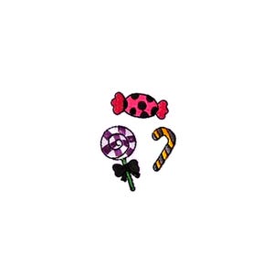 May include: A set of three colorful candy-themed iron-on patches. The patches include a pink and black candy, a purple and white swirl lollipop, and an orange and black candy cane.