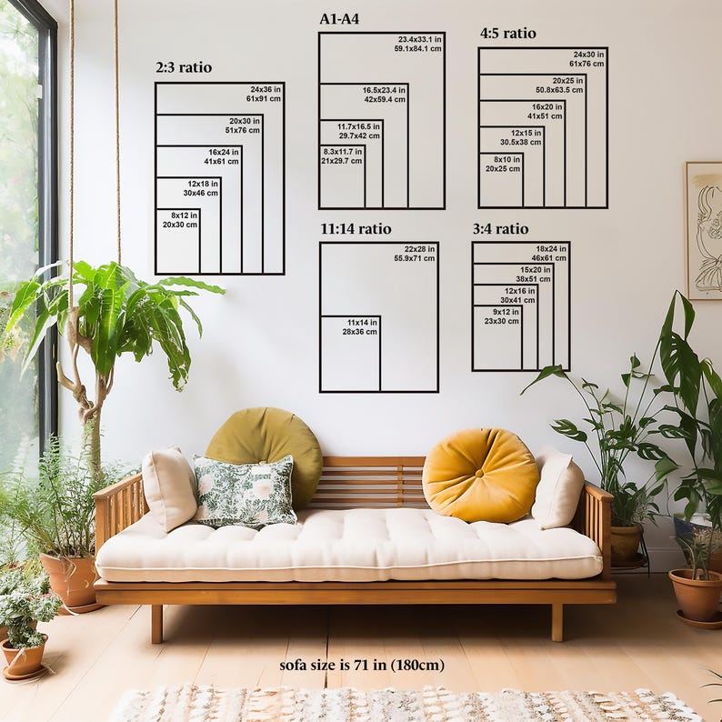 May include: A white sofa with a wooden frame and a light brown cushion. The sofa is 71 inches (180 cm) long. The wall behind the sofa has a diagram showing different aspect ratios for prints and the corresponding measurements in inches and centimeters.