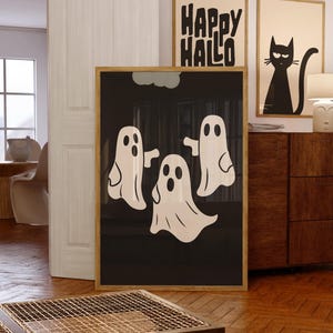 Impresión digital de tres lindos fantasmas, estilo minimalista de dibujos animados, arte blanco sobre negro, decoración de pared divertida de Halloween, póster espeluznante, estilo fantasmal embrujado