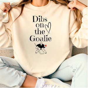 dibs on the goalie sweatshirt