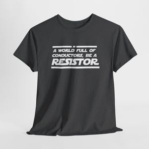 May include: A dark gray t-shirt with white text that reads "In a world full of conductors, be a resistor".