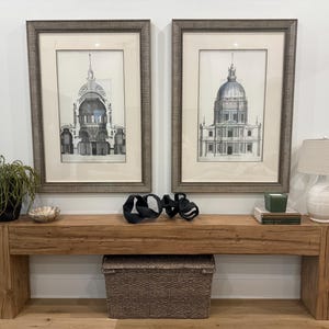 Handmade rustic wood console table with a thick plank top, chunky square legs, natural wood grain, and a warm brown finish.