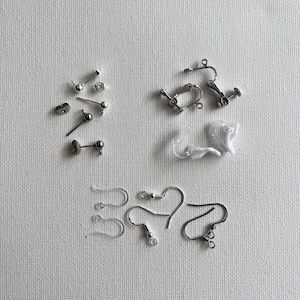 Plastic & metal ear clips, hooks and studs