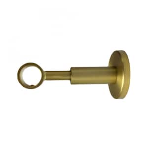 May include: A single, gold-colored curtain rod bracket. The bracket has a circular opening on one end, a cylindrical middle section, and a flat, circular base. The metal has a matte finish.