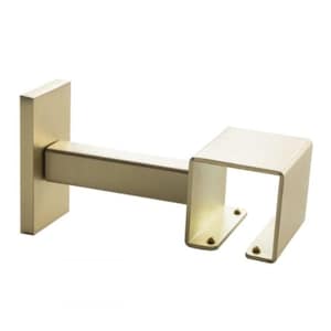 May include: A gold-colored curtain rod bracket. The bracket has a rectangular backplate, a horizontal arm, and a U-shaped holder. The bracket is made of metal and has a matte finish. The design is modern and minimalist.