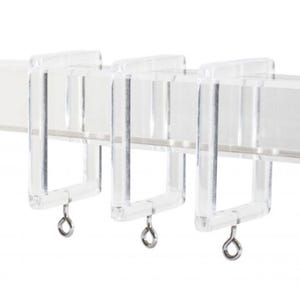 May include: Three clear plastic curtain rings with metal hooks. The rings are designed to fit over a curtain rod.