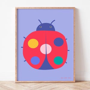 May include: A colorful illustration of a ladybug with red wings, blue spots, and a yellow spot on a light purple background.