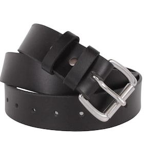 May include: A black leather belt with a silver-colored buckle. The belt is rolled up, showing the holes for the buckle. The leather appears to be smooth and the buckle is a classic, rectangular design.