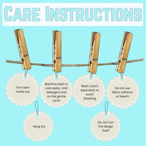 May include: A light blue graphic with the words "CARE INSTRUCTIONS" at the top. Four wooden clothespins hold tags with laundry care instructions: turn inside out, machine wash cold, wash colors separately, and do not use fabric softener.