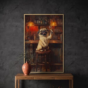 May include: A framed painting depicts a pug dog sitting on a bar stool, raising a glass of wine. The dog is in a bar setting with bottles and glasses on shelves. The painting has a warm color palette with brown, red, and gold tones.