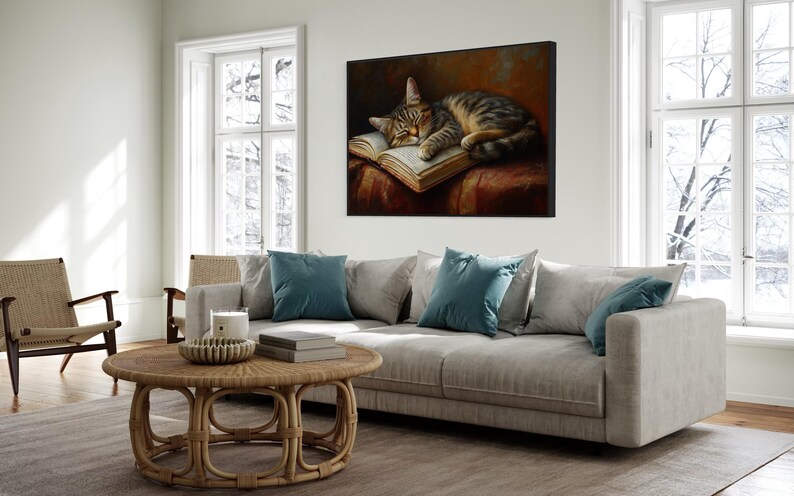 This heartwarming art print captures a peaceful kitten sleeping on an open book. The soft lighting and cozy atmosphere make this piece perfect for book lovers and cat enthusiasts alike. The detailed brushstrokes highlight the kitten’s fluffy fur, creating a charming and serene scene. Whether for a reading nook, bedroom, or study, this print adds warmth and relaxation to any space. A perfect gift for literature lovers, pet owners, or anyone who appreciates quiet, dreamy moments.