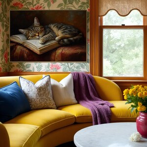 This heartwarming art print captures a peaceful kitten sleeping on an open book. The soft lighting and cozy atmosphere make this piece perfect for book lovers and cat enthusiasts alike. The detailed brushstrokes highlight the kitten’s fluffy fur, creating a charming and serene scene. Whether for a reading nook, bedroom, or study, this print adds warmth and relaxation to any space. A perfect gift for literature lovers, pet owners, or anyone who appreciates quiet, dreamy moments.