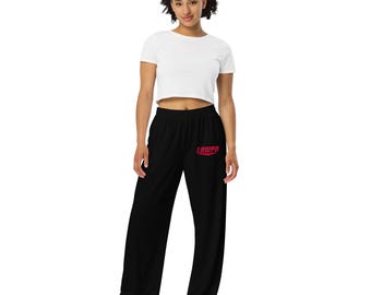 May include: Black sweatpants with a red "LOWPO" logo on the left leg.
