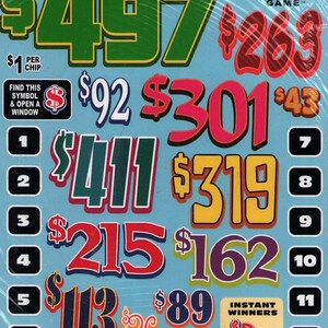 May include: A light blue Crazy Numbers Game scratch-off card featuring various dollar amounts in colorful fonts, including $497, $263, $301, $411, $319, $215, $162, $113, $92, $89, $43, and $26. It includes twelve numbered windows and instructions to find symbols.