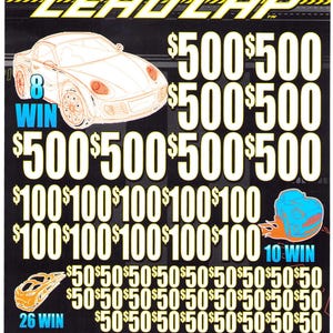 May include: A scratch-off ticket with a racing theme. The ticket features a stylized race car, the words "LEAD LAP", and various prize amounts. The ticket is black with yellow, blue, and orange accents. The text "$1 PER PLAY" is visible.