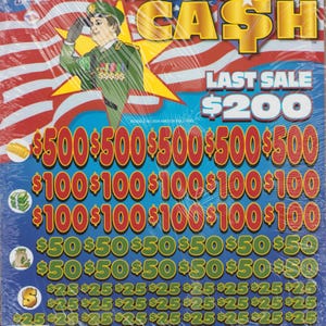 May include: A Major Cash pull-tab game card featuring a military figure saluting in front of an American flag. The card displays various cash prize amounts including $500, $100, $50, and $25, with a last sale prize of $200 and a ticket count of 5989.