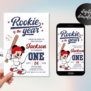 May include: A baseball-themed first birthday invitation featuring Mickey Mouse in a baseball uniform holding a bat. The invitation is blue, red, and white with the text "Rookie of the year" and "Jackson is turning one".